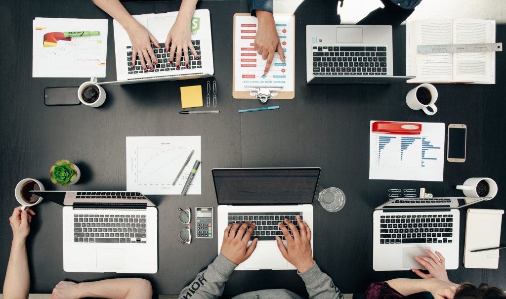 Technology meeting with hands on computer